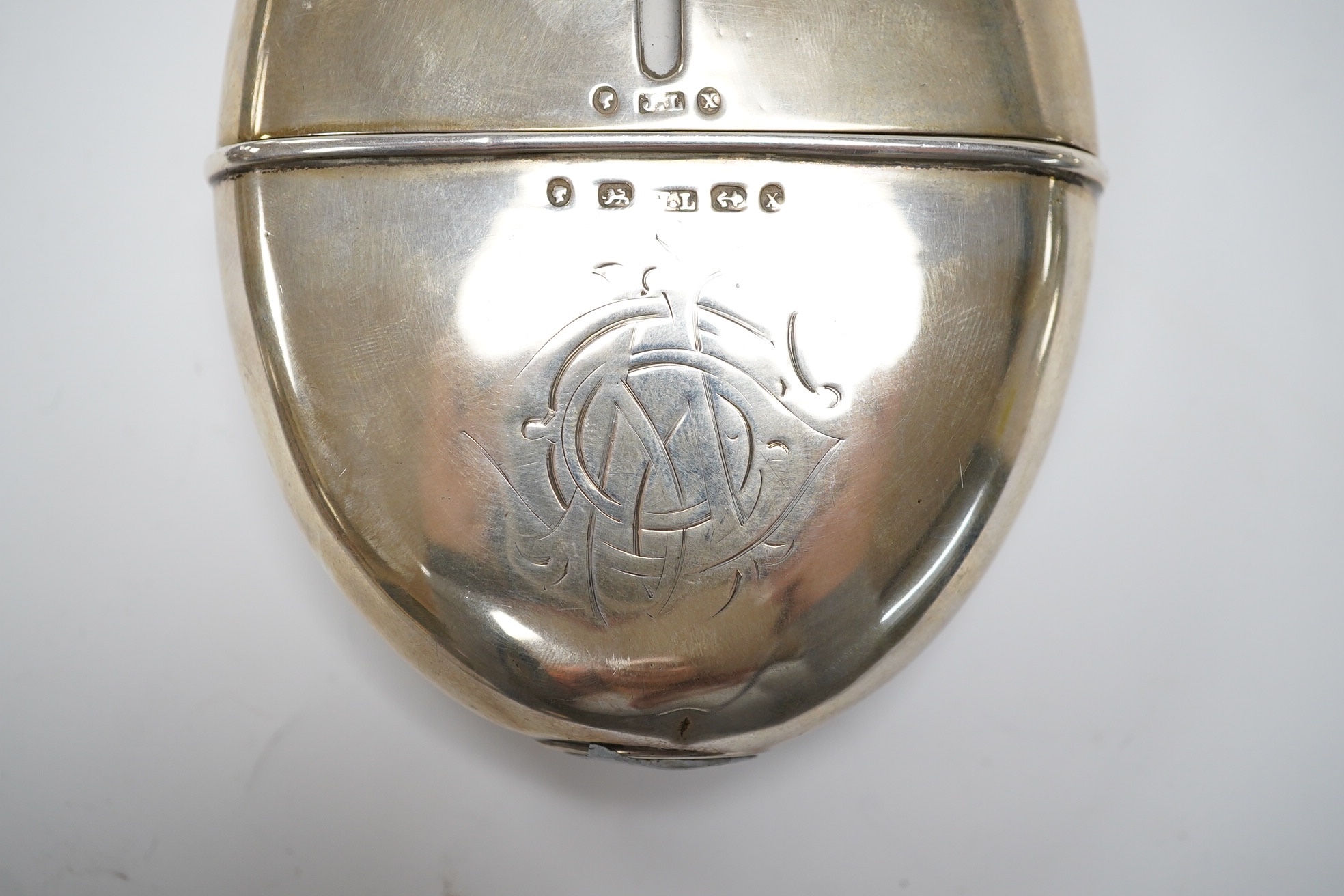 A Victorian silver oval pocket flask, John Linegar, Birmingham, 1872, 12.8cm. Condition - poor